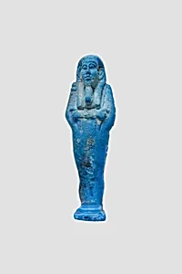 Uninscribed shabti from tomb of Nespekashuty