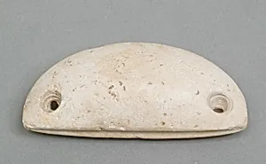 Weighing down device (fish net sinker?)