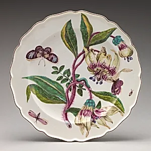 Botanical plate with spray of lilies by Chelsea Porcelain Manufactory