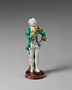 Bugler in military dress by Astbury-Whieldon