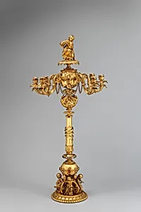 Candelabrum with woman playing flute (one of a pair)