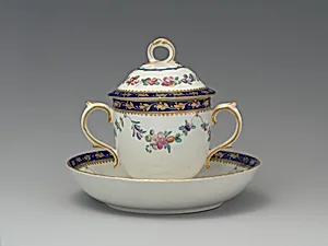 Chocolate cup with cover and saucer