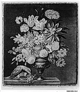 Flowers in a golden vase, with a parrot