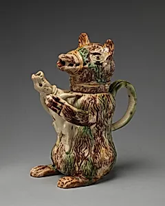 Jug in the form of a bear hugging a small dog by Astbury-Whieldon