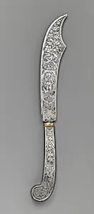 Letter opener with engraved figures