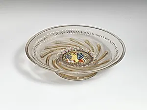 Low footed bowl with central medallion of the winged lion of St. Mark in colored enamels