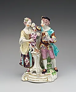 Man and girl with dog dressed as harlequin