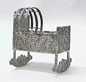 Miniature cradle (part of a set) by Unknown Artist