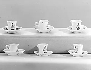 Miniature cup (part of a dollhouse set)