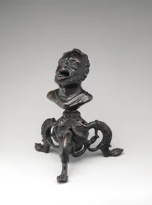 Oil lamp based on the form of an African’s head