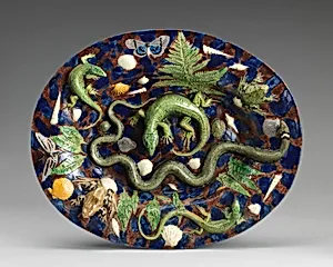 Oval basin with lizards, moths, and blue and purple background by Georges Pull