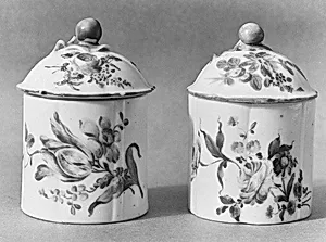 Pair of pomade jars with covers