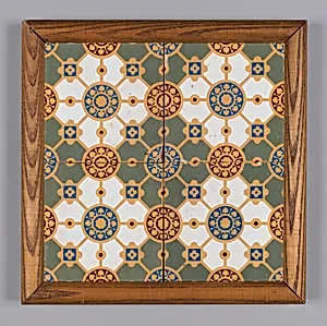 Panel of four tiles, framed