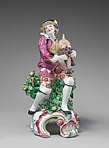 Seated musician (one of a pair)