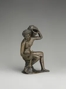 Seated youth with a lamp in the form of a snail shell