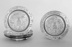 Set of four saucers by John Ruslen