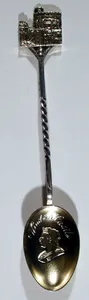 Souvenir spoon with portrait of Queen Victoria and finial in form of Windsor Castle