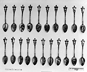 Souvenir spoon with view of a high bridge over a stream and arms of Switzerland