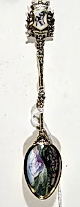 Souvenir spoon with view of town (Interlaken?) surrounded by mountains