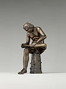Spinario (boy pulling a thorn from his foot)
