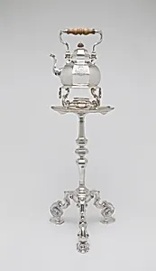 Teakettle, lamp, and table