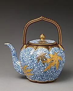 Teapot with fixed handle