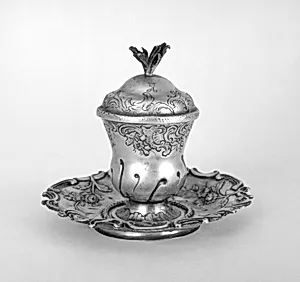 Urn-shaped inkwell with cover on stand