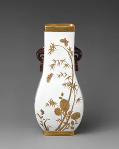 Vase with white and gold floral motifs and ring handles