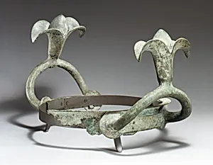 Bronze handles and part of the rim of a cauldron