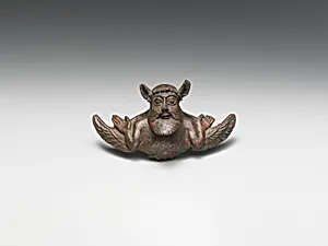 Bronze helmet attachment