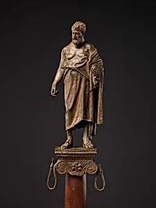 Bronze statuette of a philosopher on a lamp stand