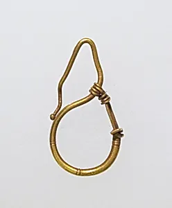 Earring, delta-shaped by Unknown Artist