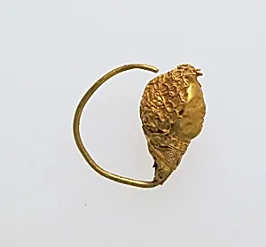 Earring with head of woman by Unknown Artist