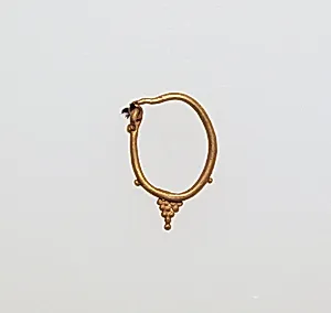 Earring with pyramid of balls by Unknown Artist