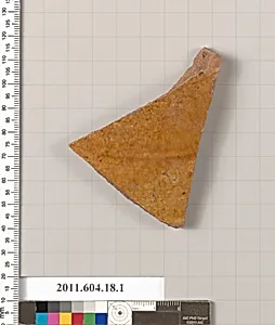 Fragment of a glazed ceramic plate or bowl
