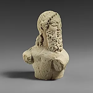 Fragment of a limestone statuette of a silen (?) by Unknown Artist
