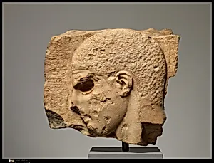 Fragment of a marble grave stele with the head of a youth