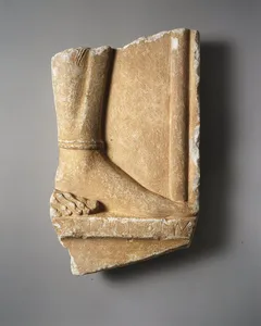 Fragmentary marble grave stele of a hoplite (foot soldier)