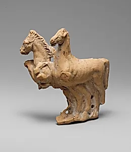Fragmentary terracotta relief with two horses from a vase