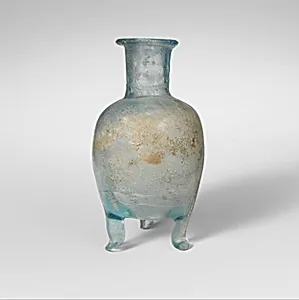 Glass bottle with three feet