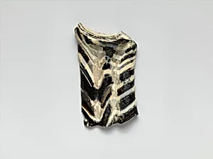 Glass mosaic handle fragment