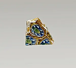 Glass mosaic ribbed bowl fragment