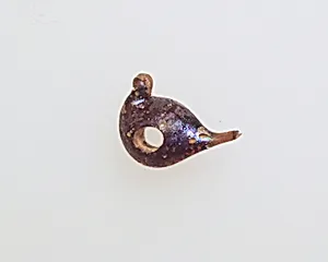 Glass pendant in the form of a bird