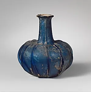 Glass ribbed bottle