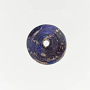 Glass spindle whorl