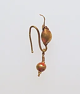 Gold earring with disc and pendant
