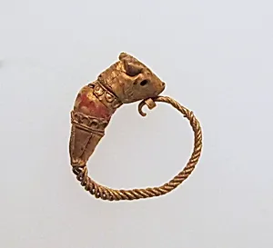 Gold earring with head of a bull