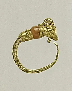 Gold earring with head of a goat