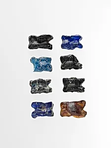 Group of eight glass astragali (knucklebones)