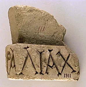 Inscribed limestone base